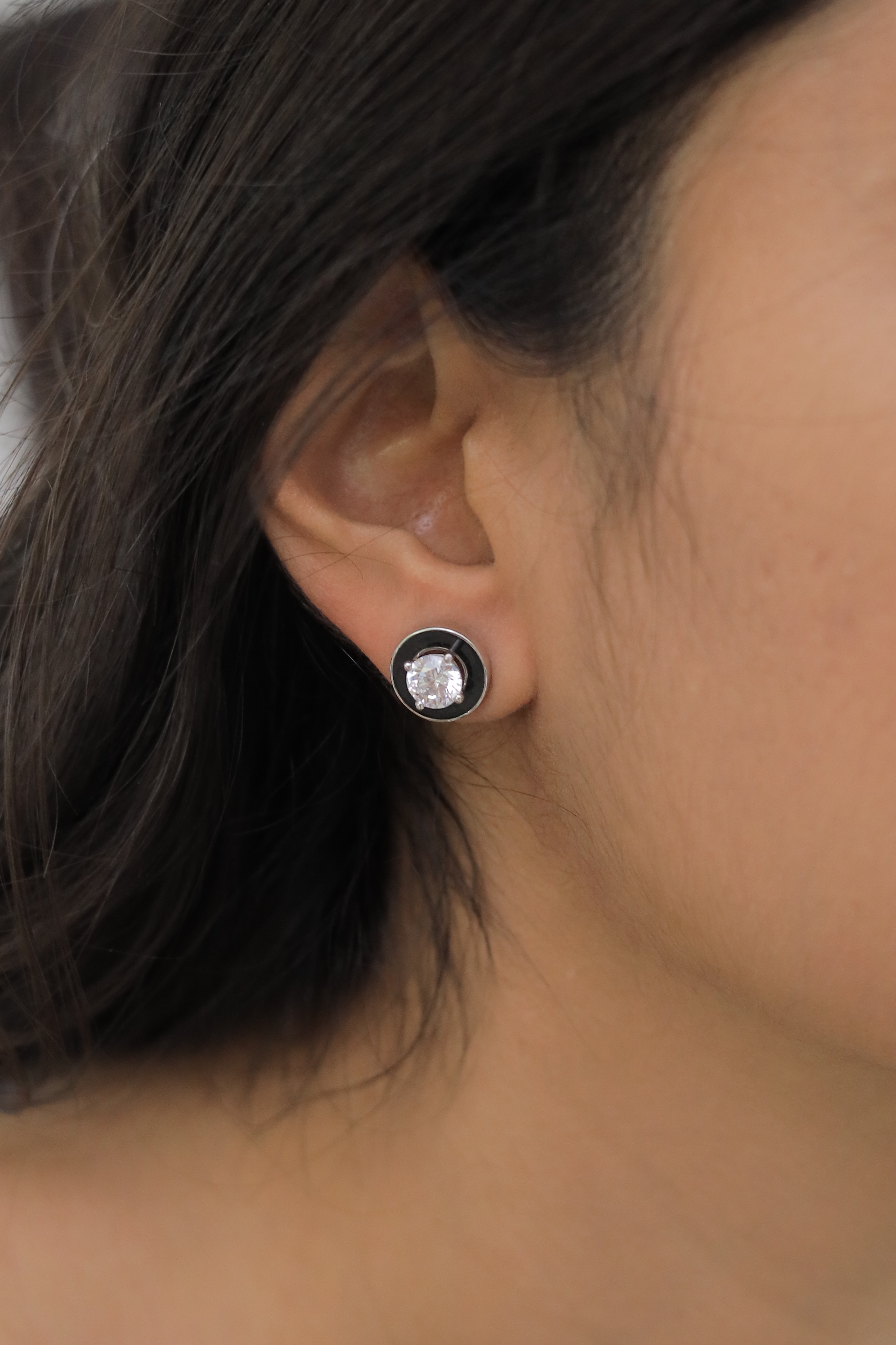Solitaire studs with removable black enamel jacket